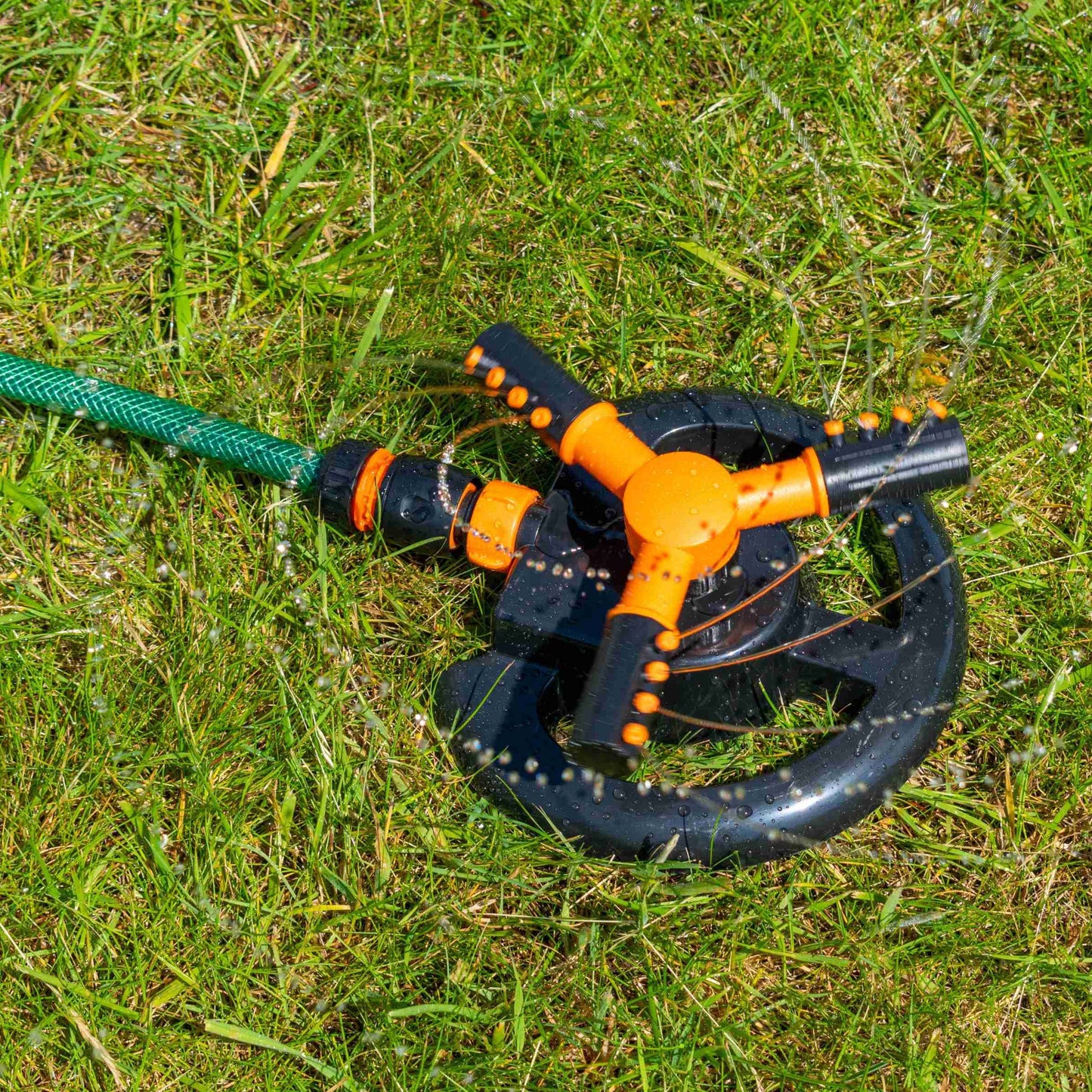 Bradas 3-Arm Rotating Garden Sprinkler – Black & Orange Line