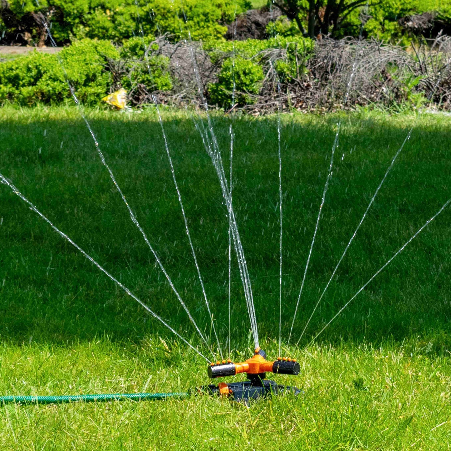 Bradas 3-Arm Rotating Garden Sprinkler – Black & Orange Line