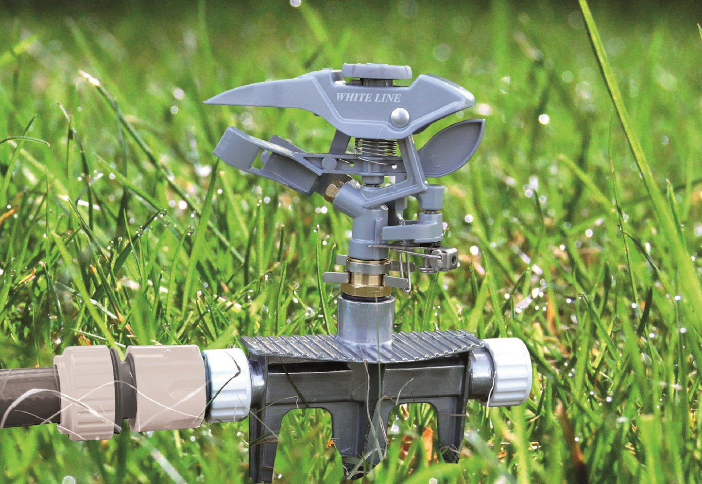 Triton Series White Line Pulsating Garden Sprinkler