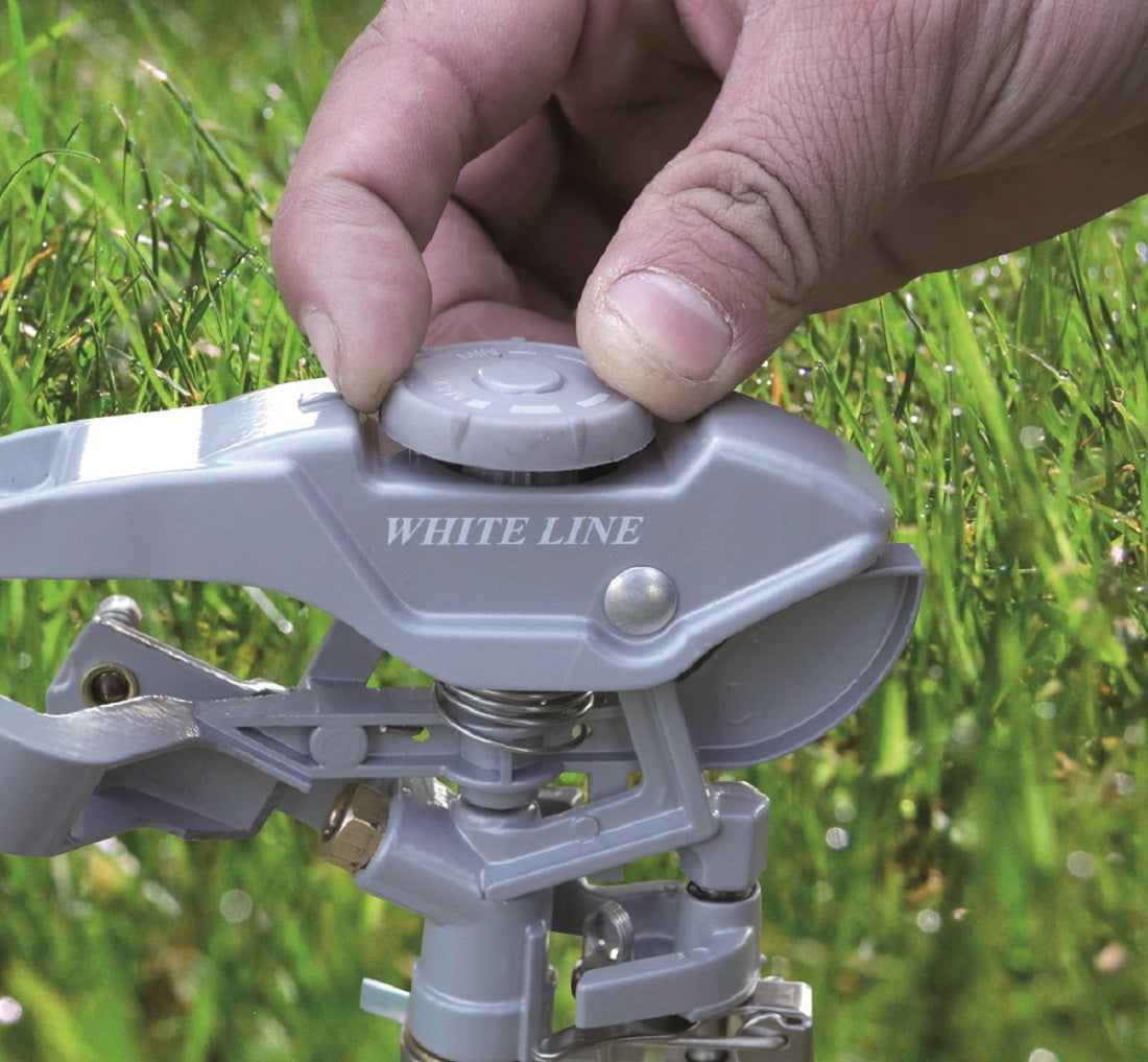 Triton Series White Line Pulsating Garden Sprinkler